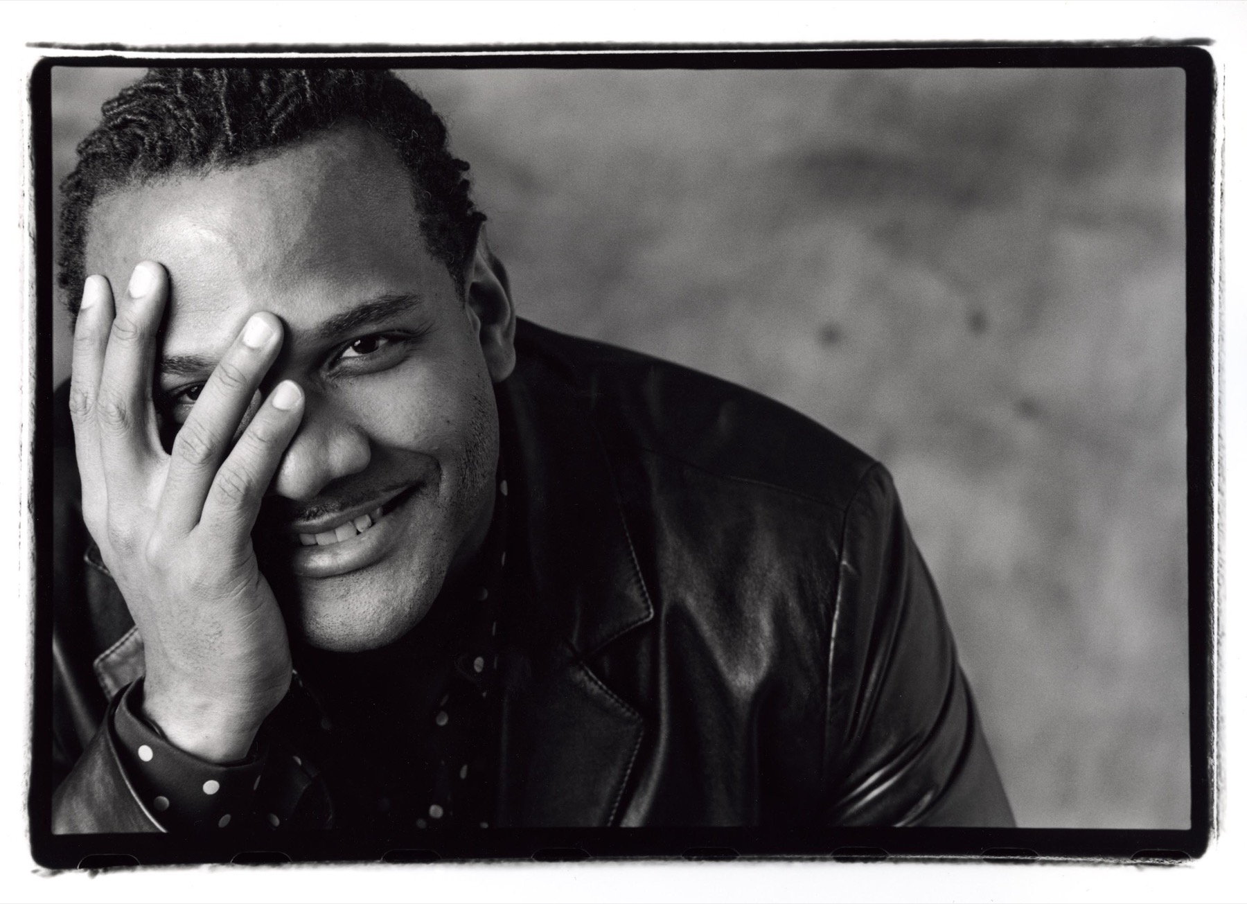 Black-and-white portrait of Kevin Clash